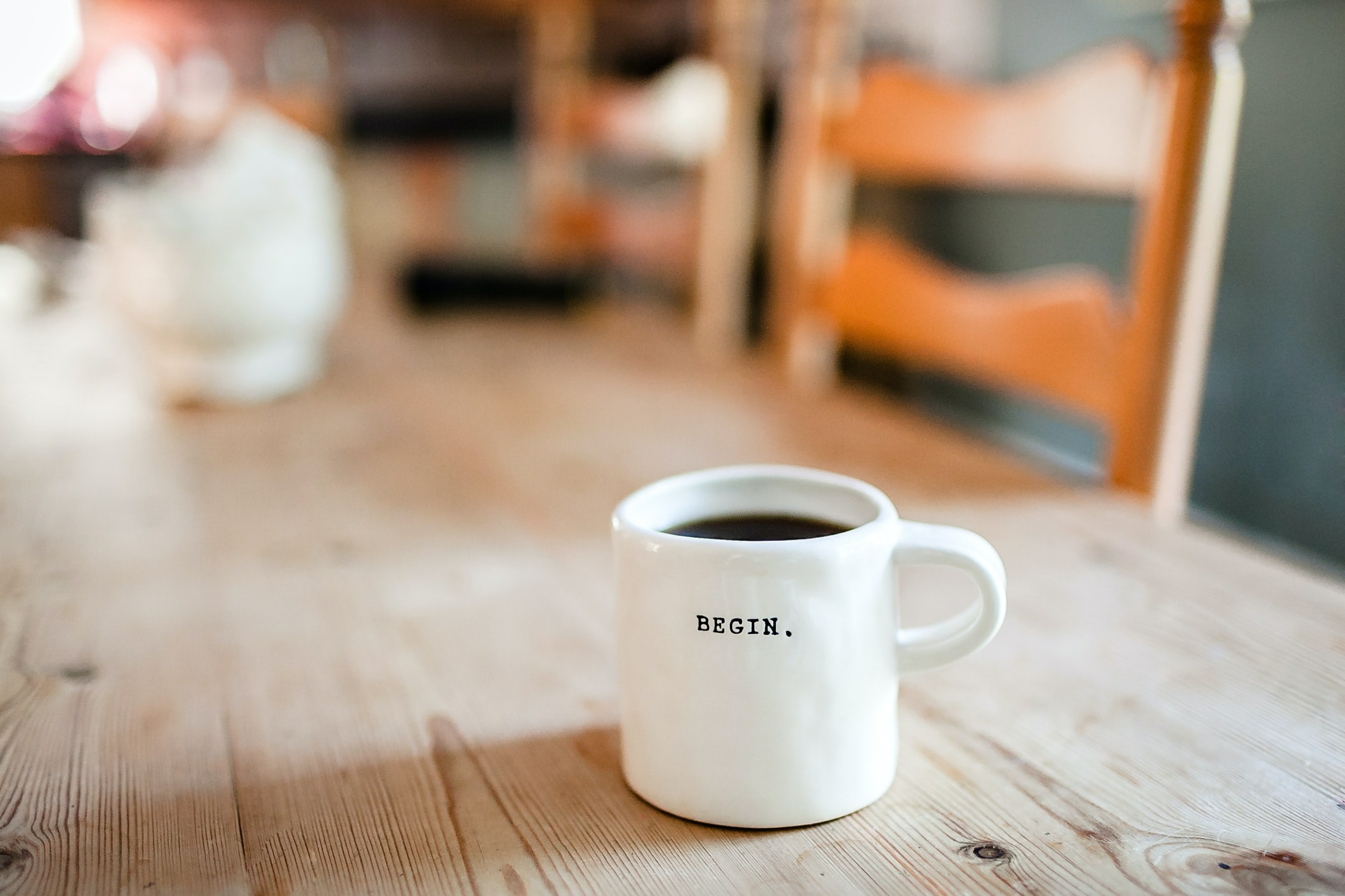 morning coffee cup sits on table in sunny room
